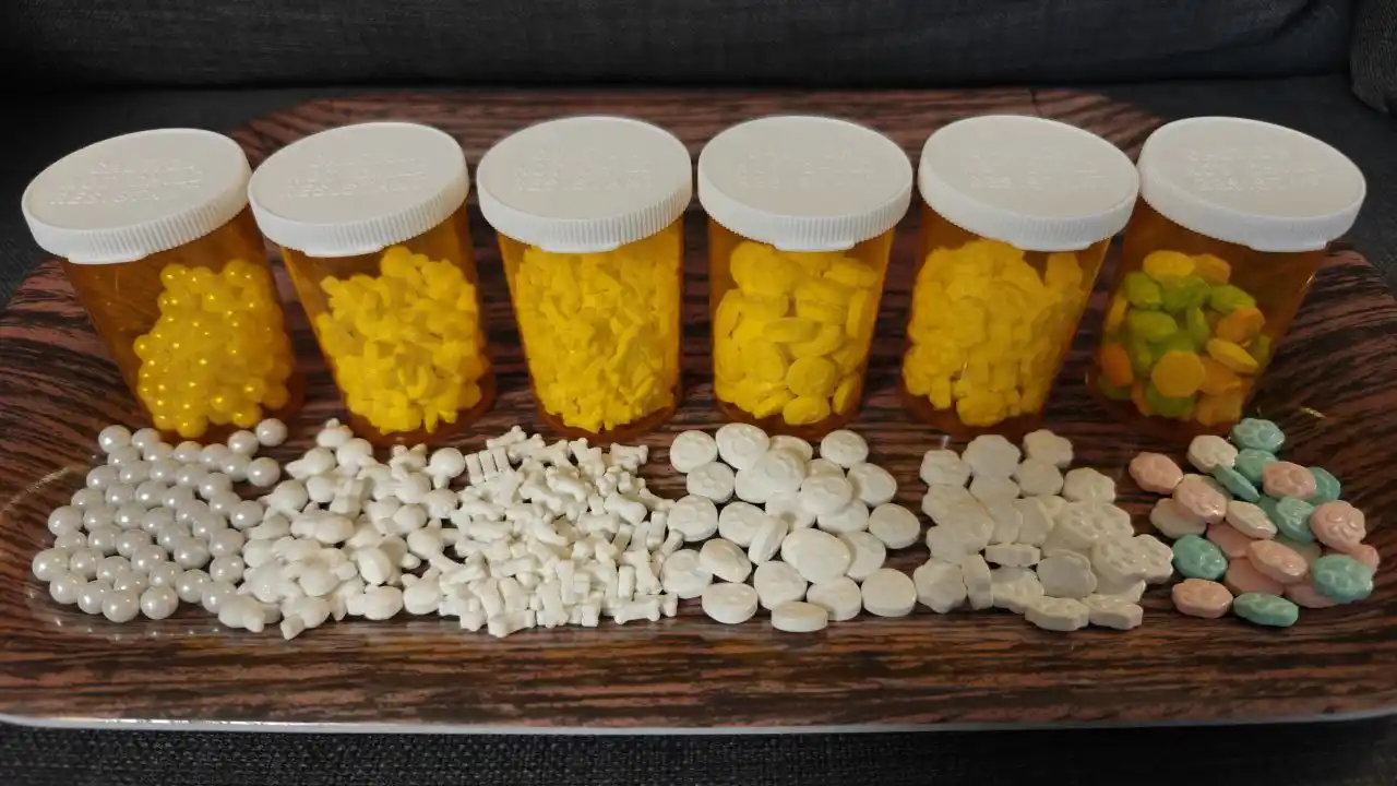 Printed and laminated version of artwork being worn with a lanyard.